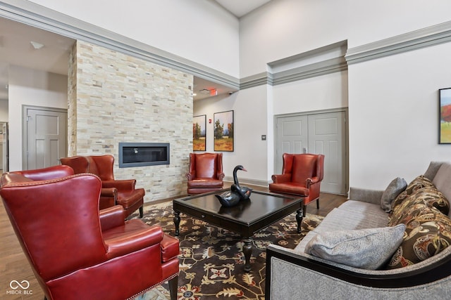 2105 Granville Dr, Westfield, IN 46074 - living room with a high ceiling, wood finished floors, and a stone fireplace