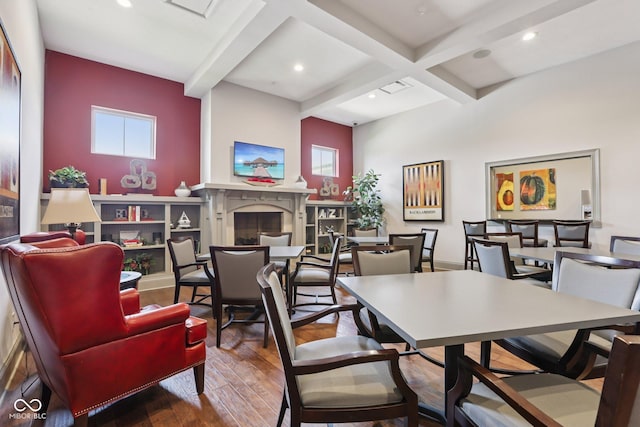 2105 Granville Dr, Westfield, IN 46074 - dining area with wood finished floors, beamed ceiling, a high end fireplace, coffered ceiling, and recessed lighting