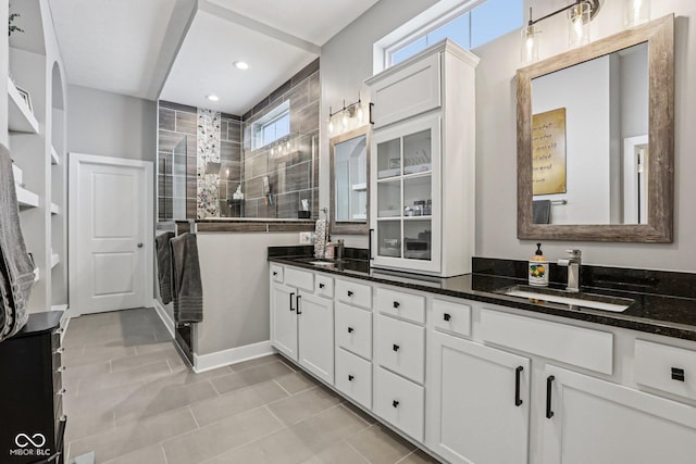 2105 Granville Dr, Westfield, IN 46074 - bathroom featuring double vanity, a shower stall, recessed lighting, and tile patterned flooring