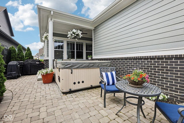 2105 Granville Dr, Westfield, IN 46074 - view of patio / terrace with a hot tub and a grill