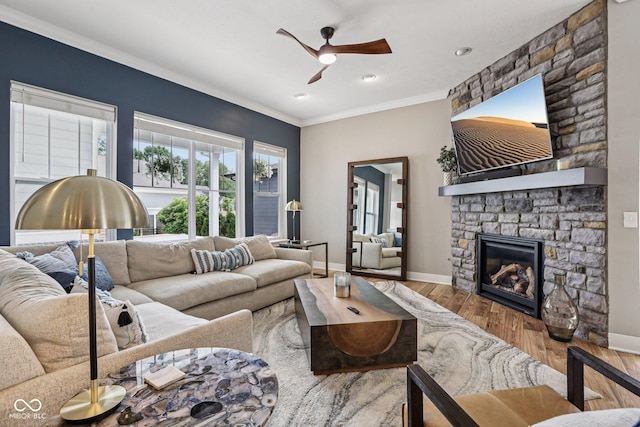 2105 Granville Dr, Westfield, IN 46074 - living room featuring ceiling fan, wood finished floors, ornamental molding, a fireplace, and recessed lighting