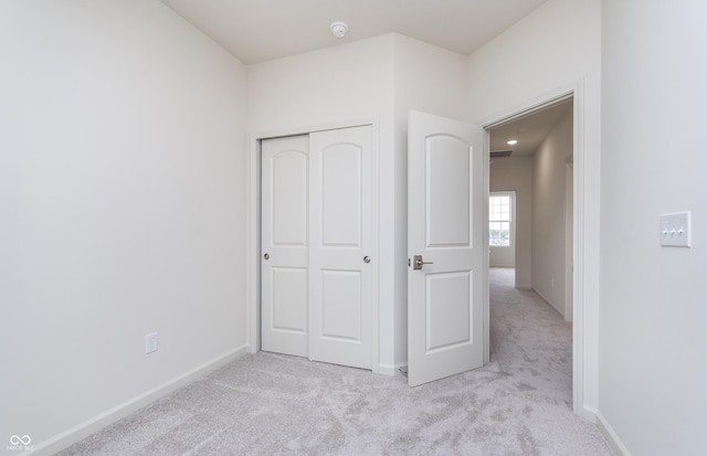 14521 Hanford Ln, Carmel, IN 46074 - unfurnished bedroom with light carpet and a closet