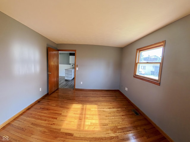 771 Doran Ave, Shelbyville, IN 46176 - unfurnished room featuring light wood-type flooring and washer / dryer