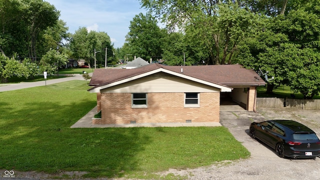 771 Doran Ave, Shelbyville, IN 46176 - view of side of home featuring crawl space, brick siding, driveway, and view of wooded area