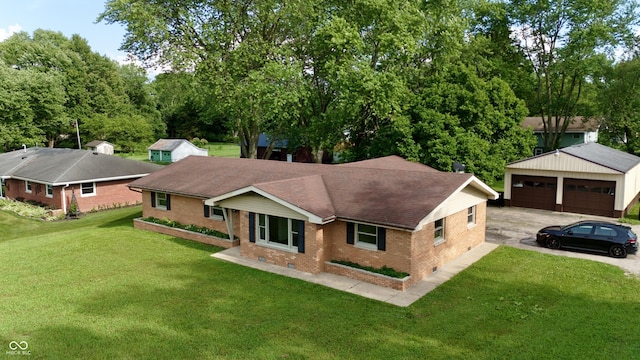 771 Doran Ave, Shelbyville, IN 46176 - view of front of property with brick siding, an outdoor structure, a garage, a front yard, and a shingled roof