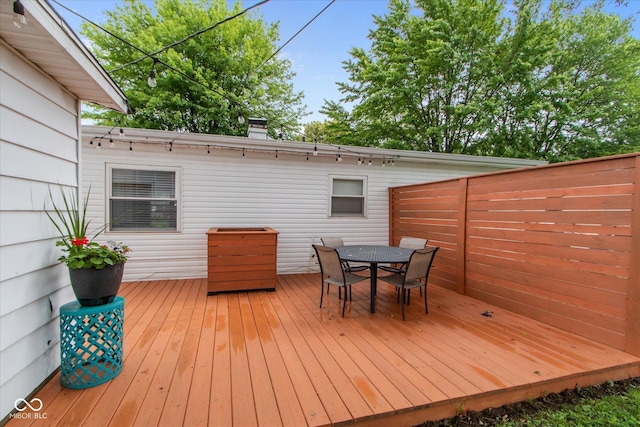 717 Berkeley Dr, Shelbyville, IN 46176 - wooden deck featuring outdoor dining area