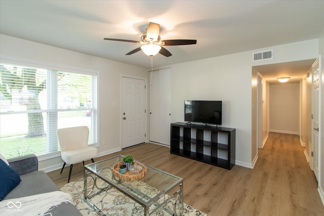 717 Berkeley Dr, Shelbyville, IN 46176 - living area with light wood-type flooring and ceiling fan