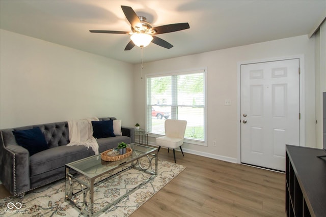 717 Berkeley Dr, Shelbyville, IN 46176 - living room featuring light wood-type flooring and a ceiling fan