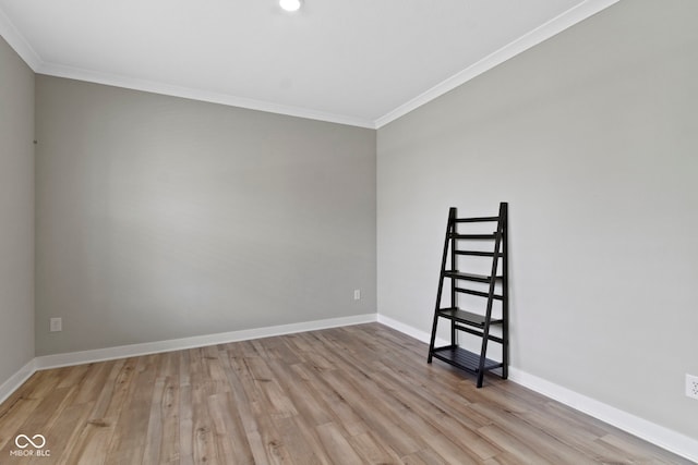 15546 Senita Ln, Fishers, IN 46037 - spare room with ornamental molding, wood finished floors, and recessed lighting