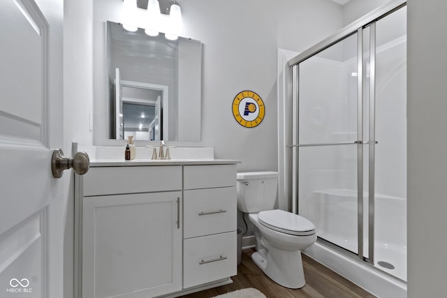 15546 Senita Ln, Fishers, IN 46037 - bathroom featuring vanity, a stall shower, and wood finished floors