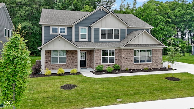 15546 Senita Ln, Fishers, IN 46037 - craftsman house featuring board and batten siding, a front lawn, and a shingled roof