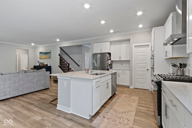 15546 Senita Ln, Fishers, IN 46037 - kitchen with stainless steel appliances, wall chimney exhaust hood, open floor plan, ornamental molding, and decorative backsplash