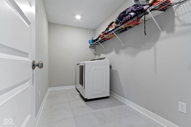 15546 Senita Ln, Fishers, IN 46037 - washroom with washer / clothes dryer and light tile patterned floors