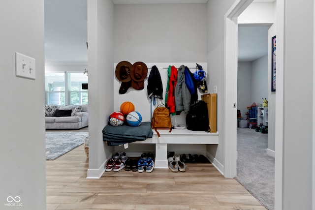 15546 Senita Ln, Fishers, IN 46037 - mudroom featuring wood finished floors and baseboards