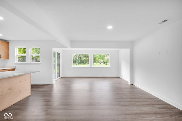 1555 N Dearborn St, Indianapolis, IN 46201 - unfurnished living room with recessed lighting and dark wood-type flooring