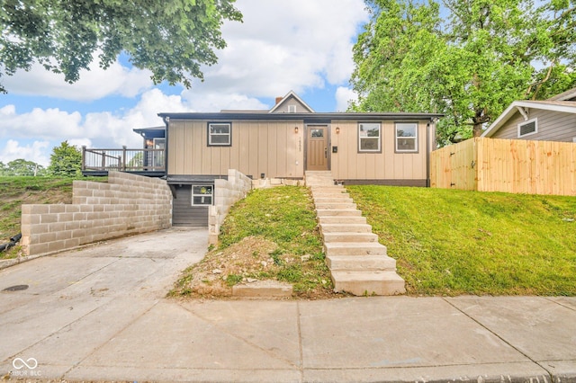 1555 N Dearborn St, Indianapolis, IN 46201 - view of front of property with stairs, concrete driveway, and board and batten siding