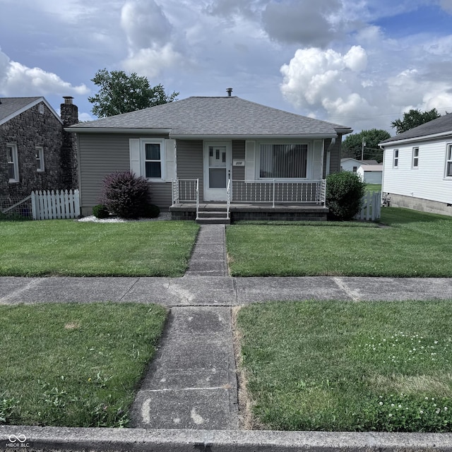206 W 2nd St, Greensburg, IN 47240 - bungalow-style home with covered porch and a shingled roof