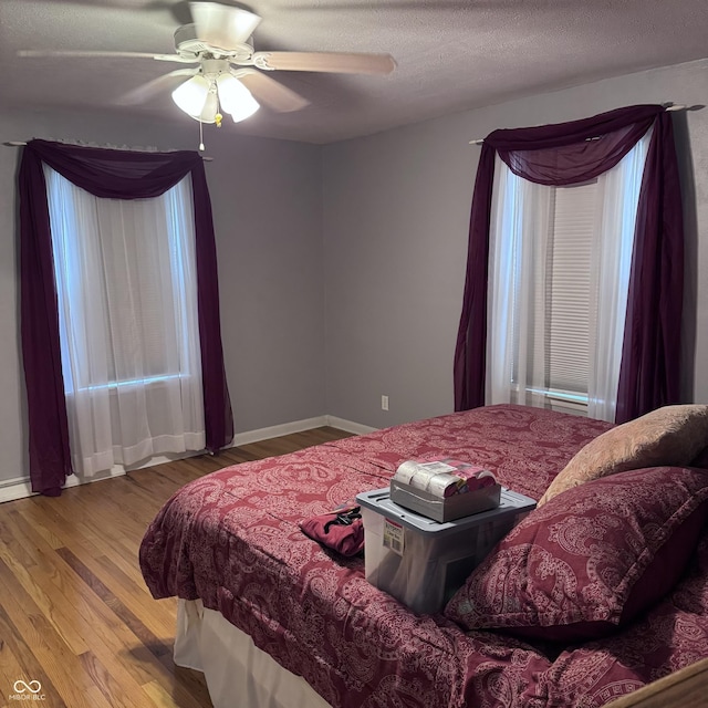 206 W 2nd St, Greensburg, IN 47240 - bedroom with wood finished floors and ceiling fan
