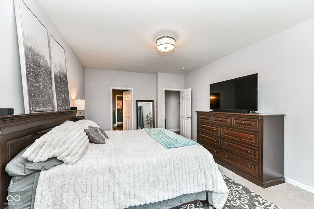 561 Farnham Dr, Westfield, IN 46074 - bedroom with carpet flooring and baseboards