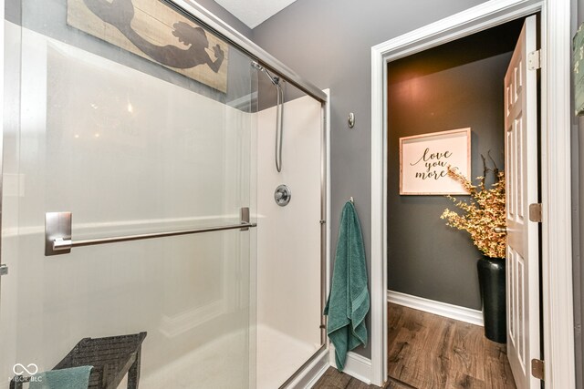 561 Farnham Dr, Westfield, IN 46074 - bathroom with wood finished floors and a shower stall