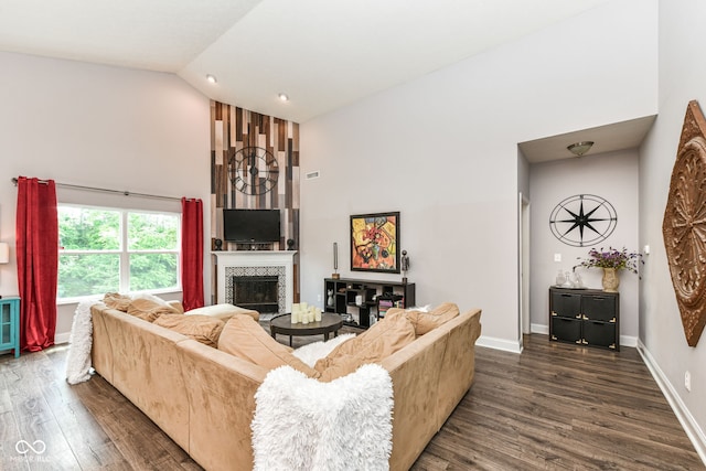 561 Farnham Dr, Westfield, IN 46074 - living area featuring high vaulted ceiling, dark wood-style flooring, and a fireplace