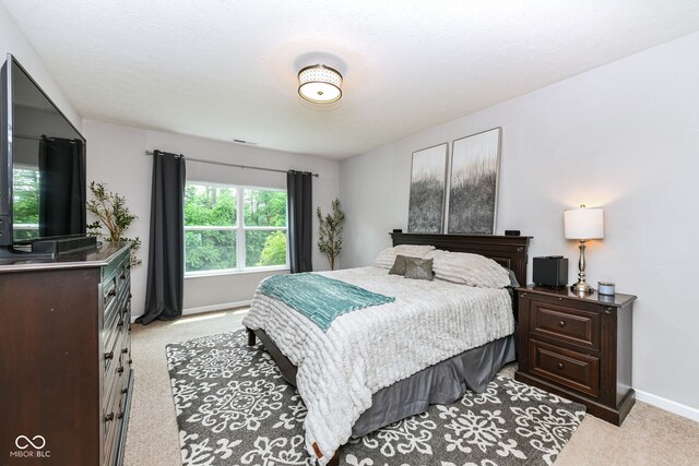 561 Farnham Dr, Westfield, IN 46074 - bedroom featuring light colored carpet and baseboards