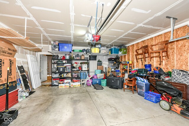 561 Farnham Dr, Westfield, IN 46074 - garage featuring a garage door opener