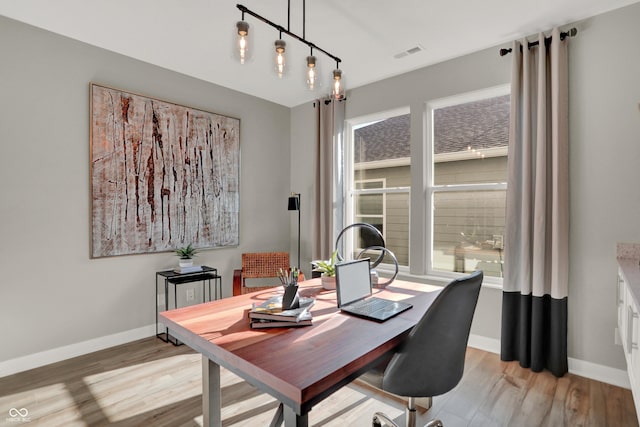 17030 Daly Dr, Noblesville, IN 46062 - home office with light wood-type flooring and healthy amount of natural light