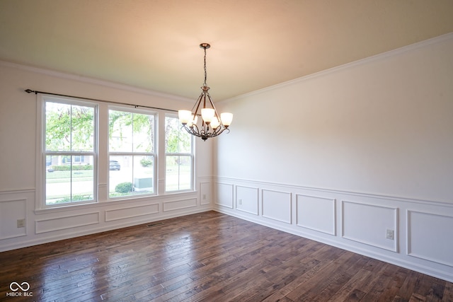 6471 W Clearview Dr, Mccordsville, IN 46055 - spare room with a chandelier, a decorative wall, plenty of natural light, dark wood finished floors, and wainscoting