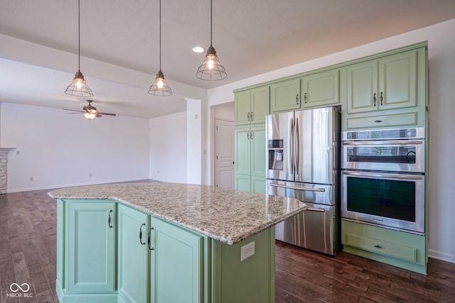 6471 W Clearview Dr, Mccordsville, IN 46055 - kitchen featuring appliances with stainless steel finishes, ceiling fan, green cabinetry, and dark wood-style floors
