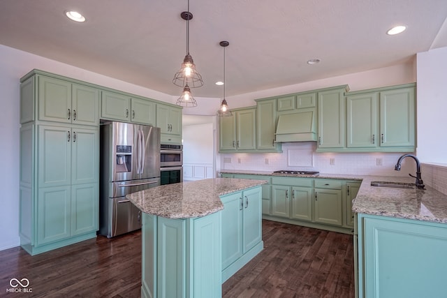6471 W Clearview Dr, Mccordsville, IN 46055 - kitchen featuring stainless steel appliances, custom exhaust hood, light stone countertops, dark wood finished floors, and recessed lighting