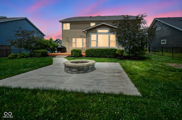 6471 W Clearview Dr, Mccordsville, IN 46055 - view of front of house with a fire pit, a patio area, and a wooden deck