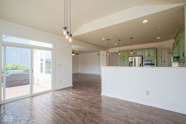 6471 W Clearview Dr, Mccordsville, IN 46055 - unfurnished living room with dark wood-style floors, lofted ceiling, ceiling fan, and recessed lighting