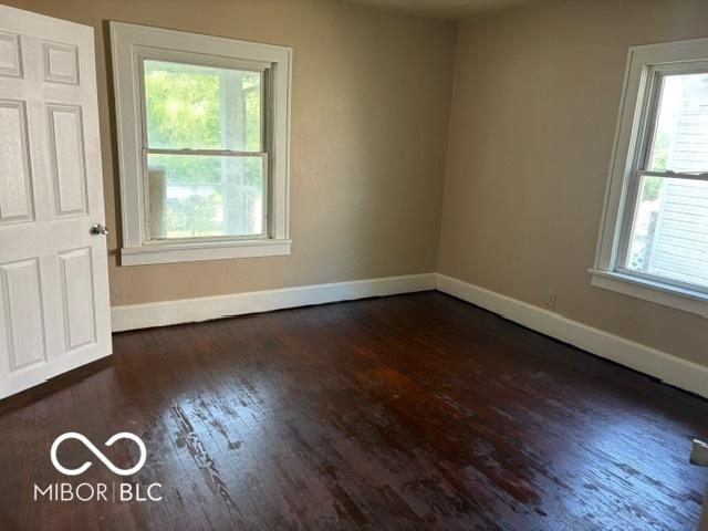 822 W 7th St, Muncie, IN 47302 - unfurnished room featuring wood finished floors