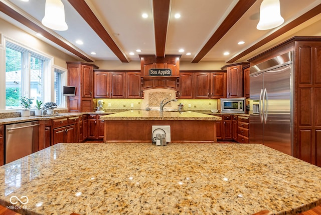 3104 E Chase Ln E, Bloomington, IN 47401 - kitchen featuring built in appliances, an island with sink, light stone countertops, backsplash, and beam ceiling