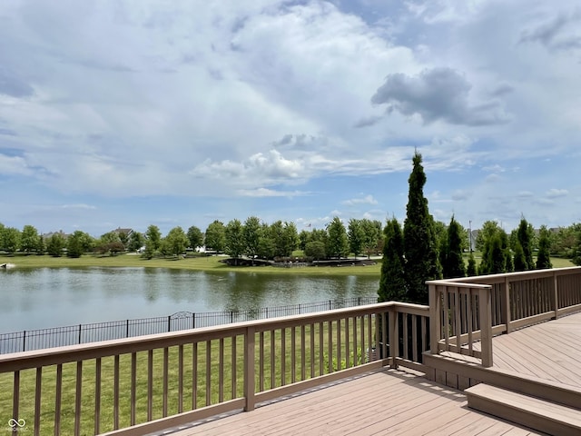 13895 Cloverfield Cir, Fishers, IN 46038 - wooden deck with a water view, a fenced backyard, and view of wooded area