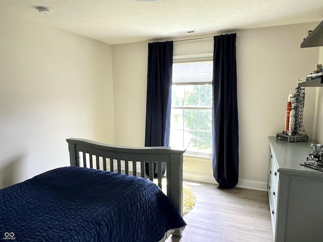 13895 Cloverfield Cir, Fishers, IN 46038 - bedroom featuring light wood-type flooring and baseboards