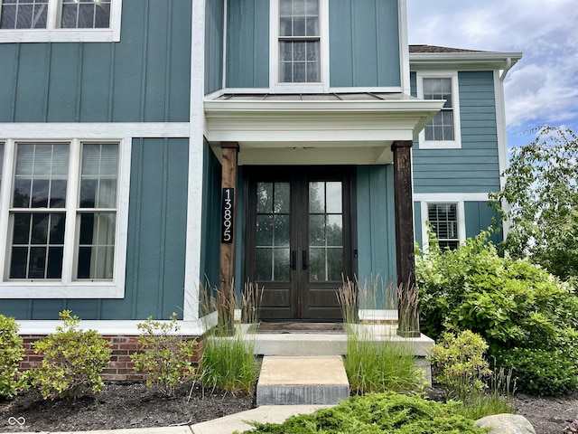 13895 Cloverfield Cir, Fishers, IN 46038 - doorway to property with french doors and board and batten siding