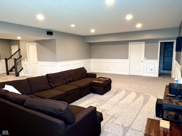 13895 Cloverfield Cir, Fishers, IN 46038 - living room with wainscoting, a decorative wall, recessed lighting, and stairway