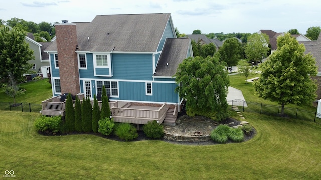 13895 Cloverfield Cir, Fishers, IN 46038 - rear view of house with a deck, roof with shingles, and a chimney