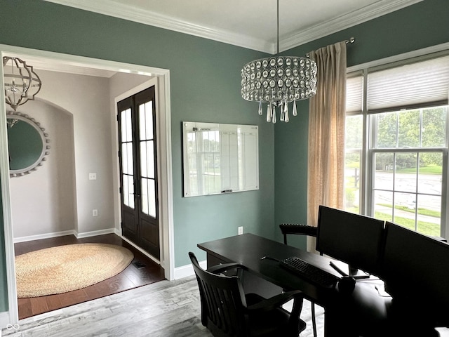 13895 Cloverfield Cir, Fishers, IN 46038 - dining space with crown molding, plenty of natural light, a chandelier, wood finished floors, and an office area