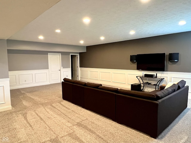 13895 Cloverfield Cir, Fishers, IN 46038 - carpeted home theater room featuring recessed lighting, a decorative wall, and a wainscoted wall