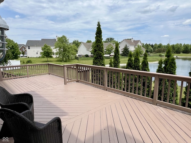 13895 Cloverfield Cir, Fishers, IN 46038 - wooden terrace with a lawn, a water view, and a residential view