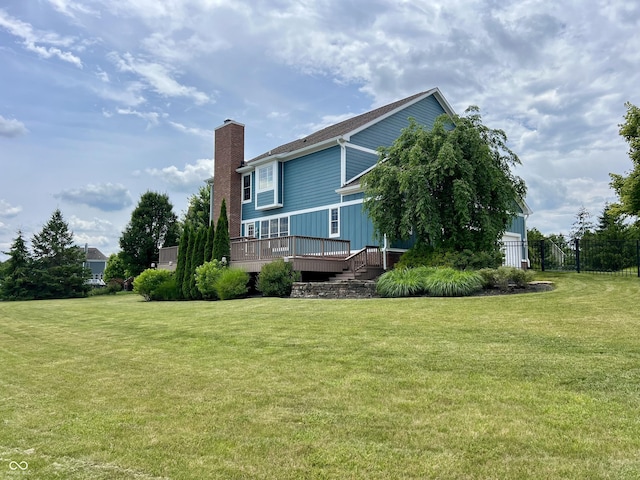 13895 Cloverfield Cir, Fishers, IN 46038 - view of property exterior featuring a chimney and a wooden deck
