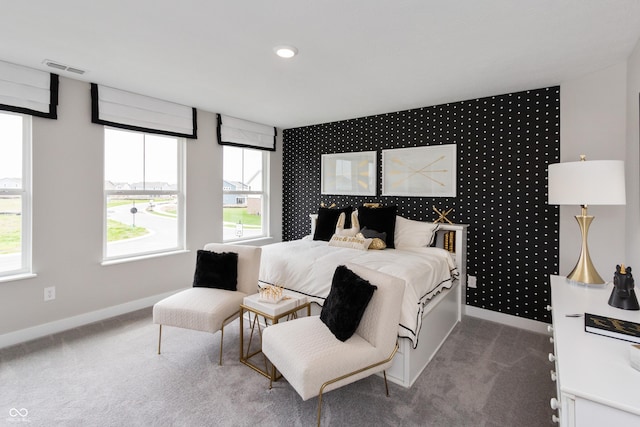17050 Daly Dr, Noblesville, IN 46062 - bedroom featuring an accent wall, carpet flooring, and multiple windows