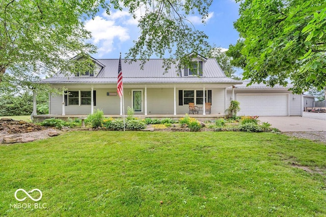 3139 E 150 S, Crawfordsville, IN 47933 - view of front of home featuring a porch, a garage, a front lawn, and driveway