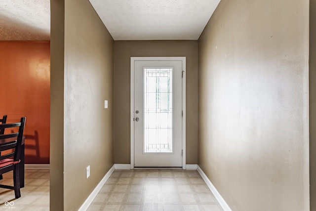 3872 Dusty Sands Rd, Whitestown, IN 46075 - doorway with light flooring, plenty of natural light, and a textured ceiling