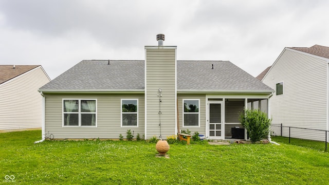 3872 Dusty Sands Rd, Whitestown, IN 46075 - rear view of house featuring a sunroom, a shingled roof, and a chimney