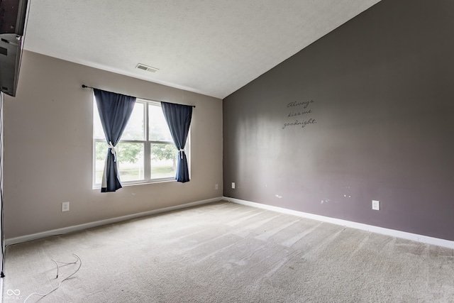 3872 Dusty Sands Rd, Whitestown, IN 46075 - unfurnished room with carpet flooring, a textured ceiling, and lofted ceiling