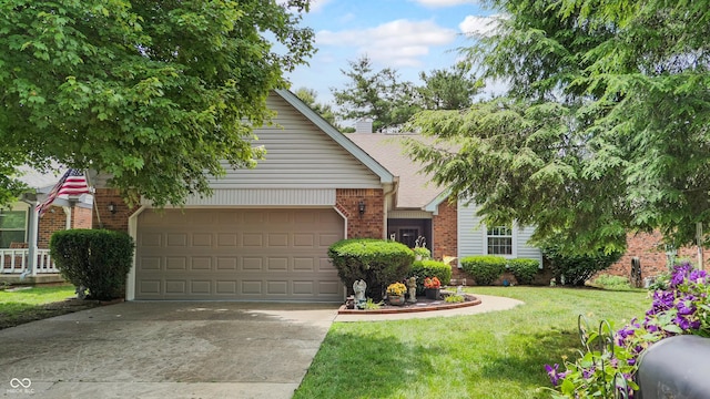1067 Acadia Ct, Indianapolis, IN 46217 - view of front of house featuring brick siding, concrete driveway, an attached garage, and a front yard